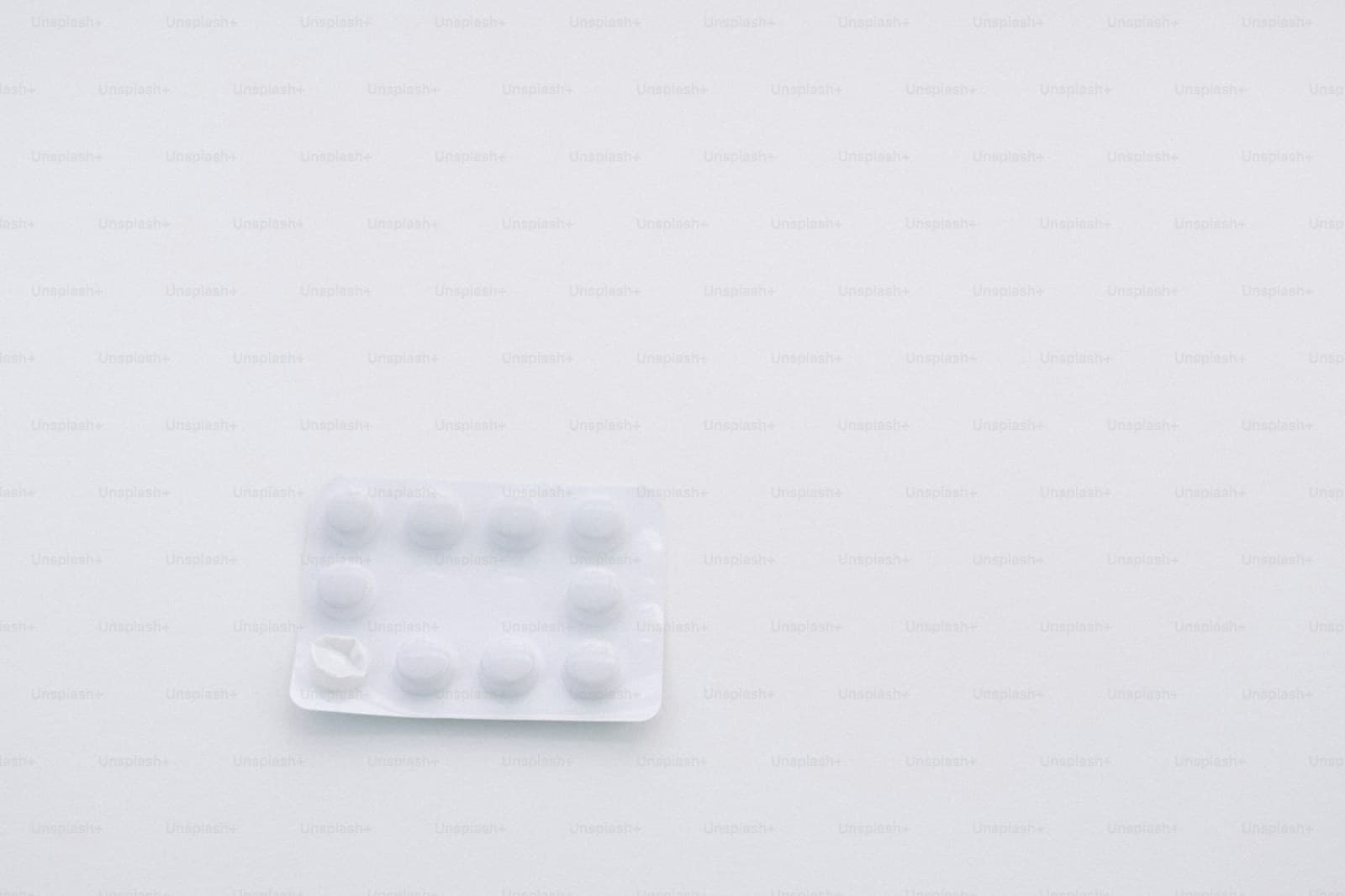 Brown medicine bottle on a white surface
